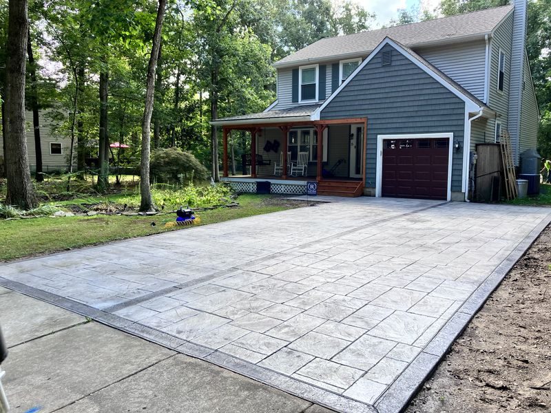 Stamped concrete driveway by Jersey Concrete